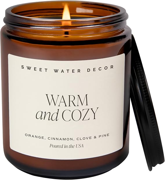 Sweet Water Decor Warm & Cozy Candle, 9oz Amber Glass Jar, Winter Scents